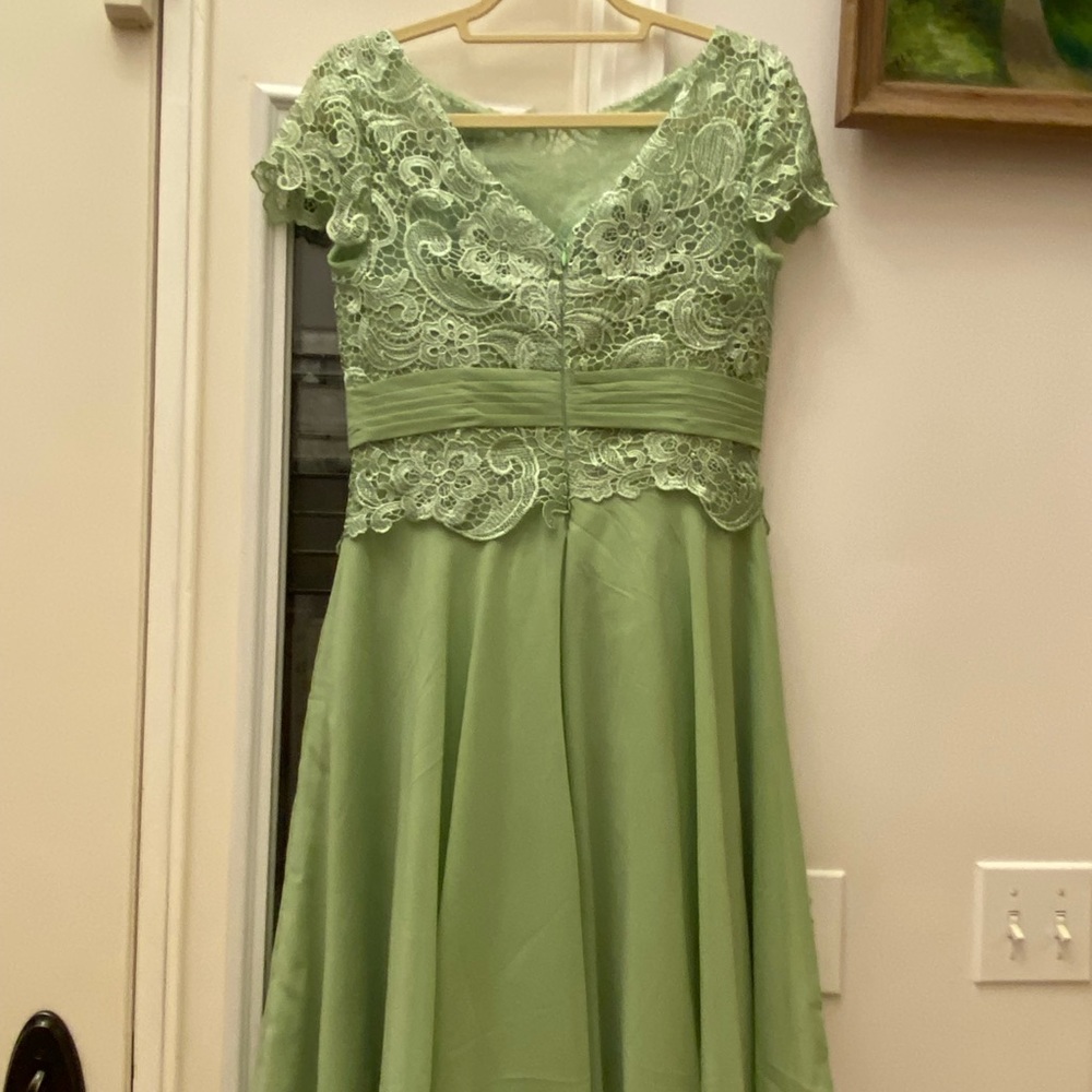 Bridesmaid dress.  Sage green with lace detail.  Built in bra. Knee length. New